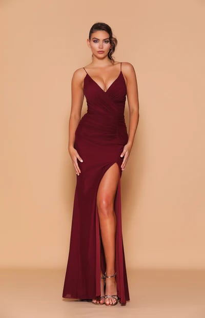 The timeless and beautiful full-length gown has stunning detailing of gathered ruching along the torso both front and back.