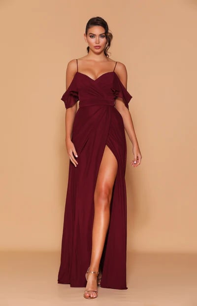 A stunning full-length gown featuring a sweetheart neckline with cold-shoulder detailing.