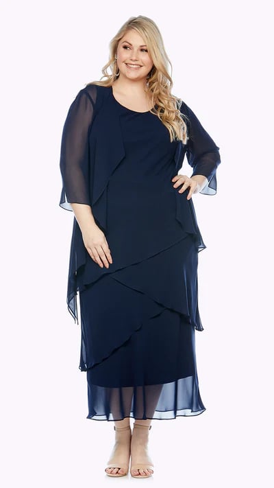 Elegant tiered midi dress in soft chiffon fabric with a sheer jacket.