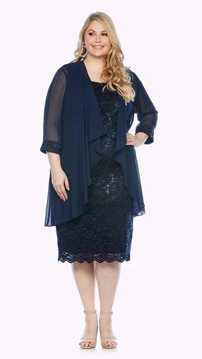 Elegant mid-length cocktail lace dress with scattered subtle sequin detail and scallop-edged hemline. This dress comes with a sheer chiffon jacket with a lace detailed cuffs.