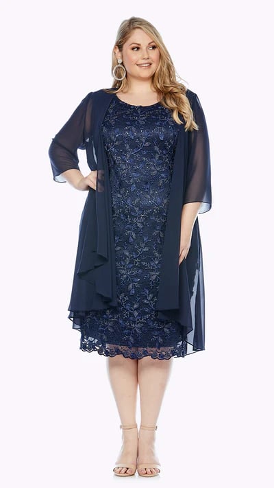 Elegant and sleeveless cocktail length French Guipure lace dress, with a scalloped edged hemline. Also an added sheer chiffon jacket.