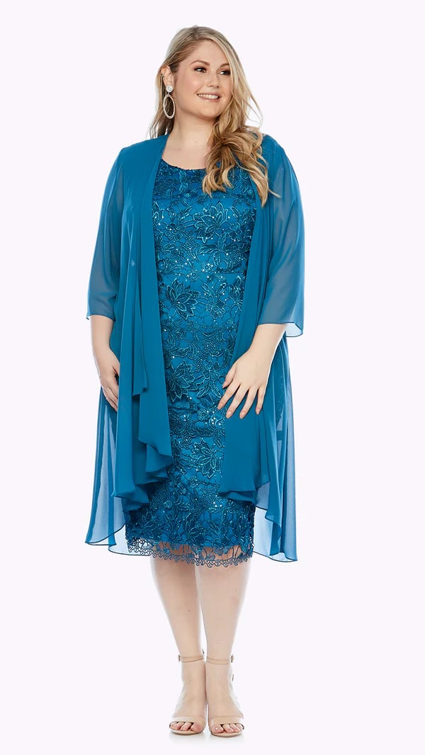 Elegant and sleeveless, the embroidered lace dress has an edged hemline, with a long sheer chiffon jacket.